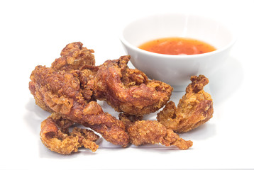 Fried chicken skin on white background.