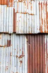 Old Zinc background, Rusted corrugated zinc sheets overlapping to form a fence