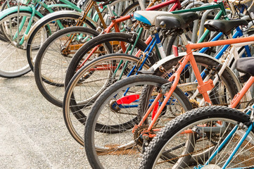 Fototapeta na wymiar Close up of wheels of bicycles