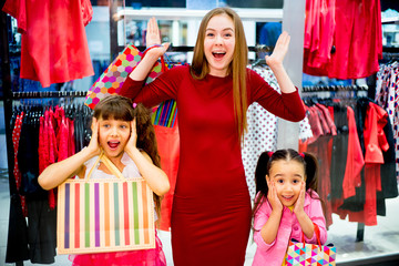 Fototapeta premium Mother and daughters shopping