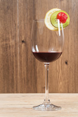 Glass of wine with fruit