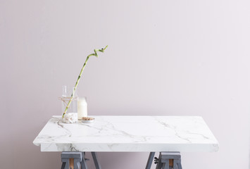 empty marble table and vase of flowers home concept