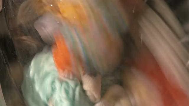 High quality video of putting dirty dishes to the dishwasher in 4K