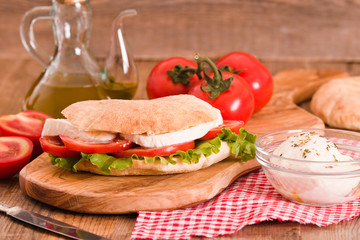 Puccia bread with mozzarella and tomato.
