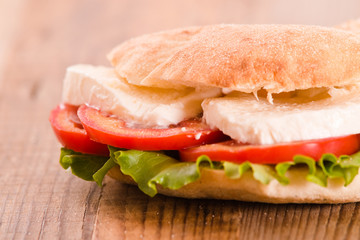 Puccia bread with mozzarella and tomato.