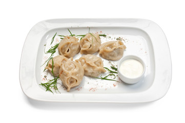 dish of ravioli with sour cream