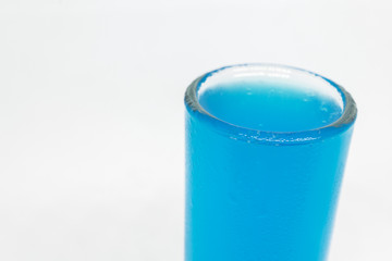 Close up blue soda on white background. Beverage concept.