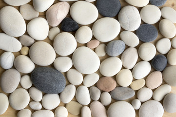 White, grey and pink pebbles background, wooden background, simplicity, daylight, stones