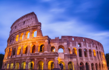 Fototapeta na wymiar Roman Colosseum after sunset in colorful long exposure