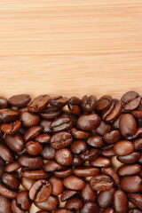 coffee beans on a wooden background
