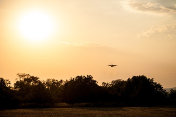 Landing large airliner at sunset (Brno Airport, Czech Republic)