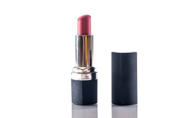 Obraz premium Red lipstick isolated on white background .