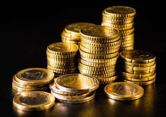 Euro coins.Coins stacked on each other in different positions. Money concept