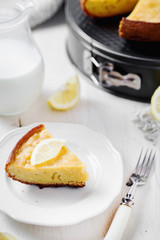 Desserts and pastries, sweet food, lemon biscuit pie with milk on a light wooden background 