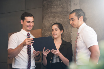 Business people doing brainstorming meeting at the office.