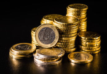 Euro coins.Coins stacked on each other in different positions. Money concept