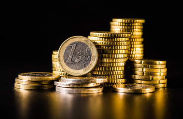 Euro coins.Coins stacked on each other in different positions. Money concept