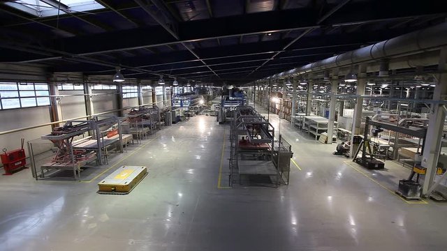 Industrial interior, production of ceramic tiles, modern factory interior, Electrical Automated Guided Vehicles Platform