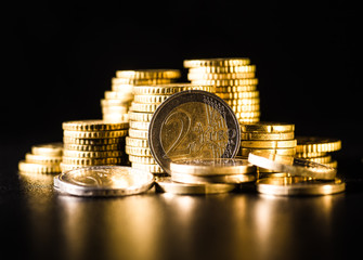 Euro coins.Coins stacked on each other in different positions. Money concept
