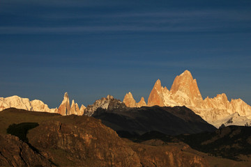 Fototapeta premium Fitz Roy and Cerro Torre mountainline at sunrise, Los Glaciares National Park, El Challten, Patagonia, Argentina