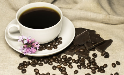 Good morning! Lilac flowers and coffee
