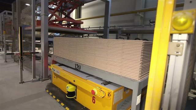 Industrial interior, production of ceramic tiles, modern factory interior, Electrical Automated Guided Vehicles Platform