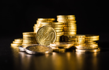 Euro coins.Coins stacked on each other in different positions. Money concept
