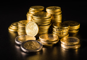 Euro coins.Coins stacked on each other in different positions. Money concept