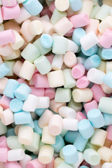 Background or texture of colorful mini marshmallows.