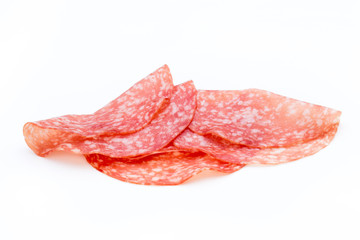Salami smoked sausage slices isolated on white background cutout.