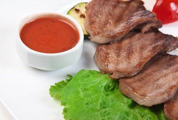 dishes of roast meat