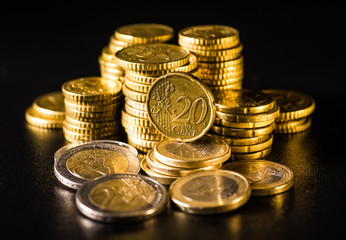 Euro coins.Coins stacked on each other in different positions. Money concept