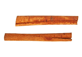 Cinnamon sticks on a white background, top view