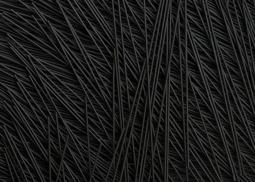 full image of black squid ink spaghetti. Food background with a pasta in different direction to course dramatic effect, copy space ideal for type