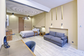 Russia, Moscow - modern designer renovation in a luxury building. Stylish bedroom interior with double bed.

