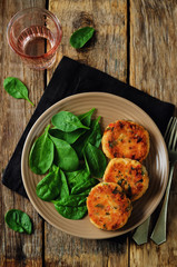 Salmon fritters with spinach