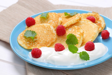 american pancakes with yogurt and raspberries