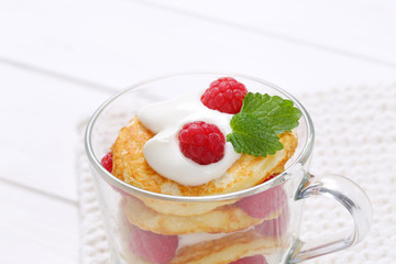 american pancakes with yogurt and raspberries