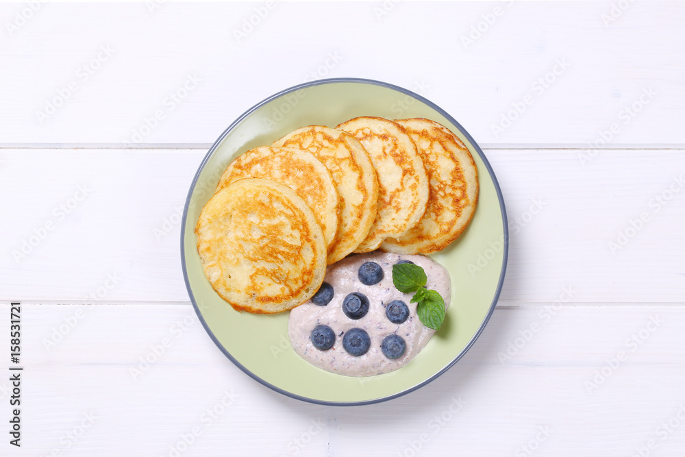 Sticker american pancakes with yogurt and blueberries