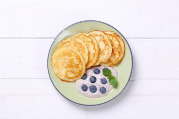 american pancakes with yogurt and blueberries