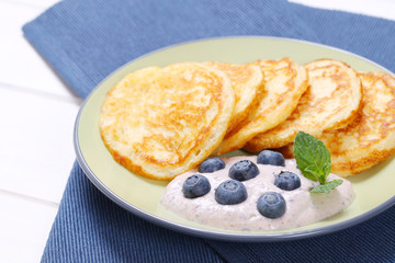 american pancakes with yogurt and blueberries