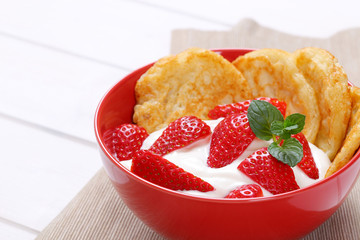 american pancakes with yogurt and strawberries