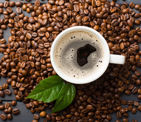 black coffee beans on black background