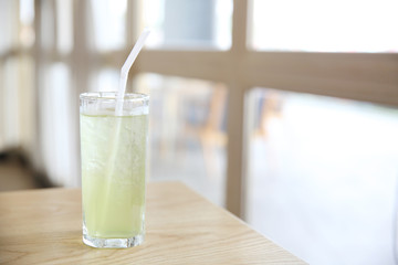 iced green tea on wood