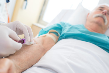 doctor giving an injection to a patient