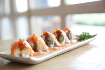 Japanese food Salmon roll on wood background