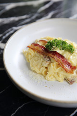 Spaghetti white sauce with bacon and cheese
