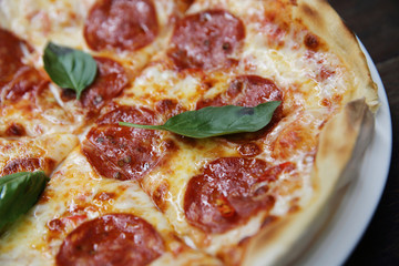 peperoni pizza on wood