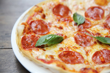 pepperoni pizza on wood