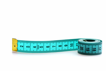 Roll of greenish blue measuring tape isolated on white background